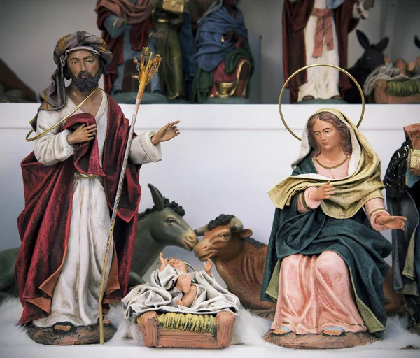 The holy family on sale in a Christmas market — Stock Photo, Image