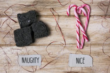 candy coal and candy cane for naughty or nice kids clipart