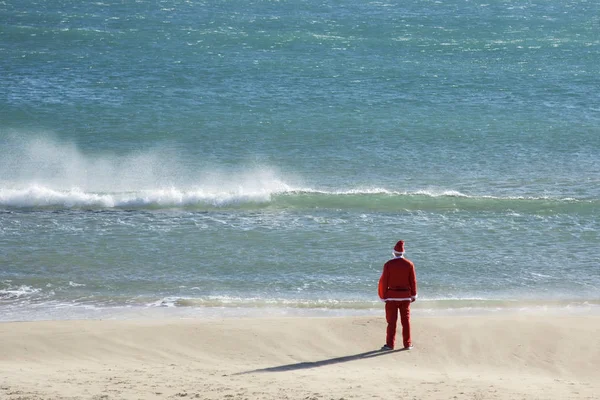 Santa claus on the beach — Stock Photo, Image