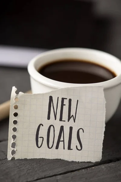 Text new goals in a piece of paper — Stock Photo, Image