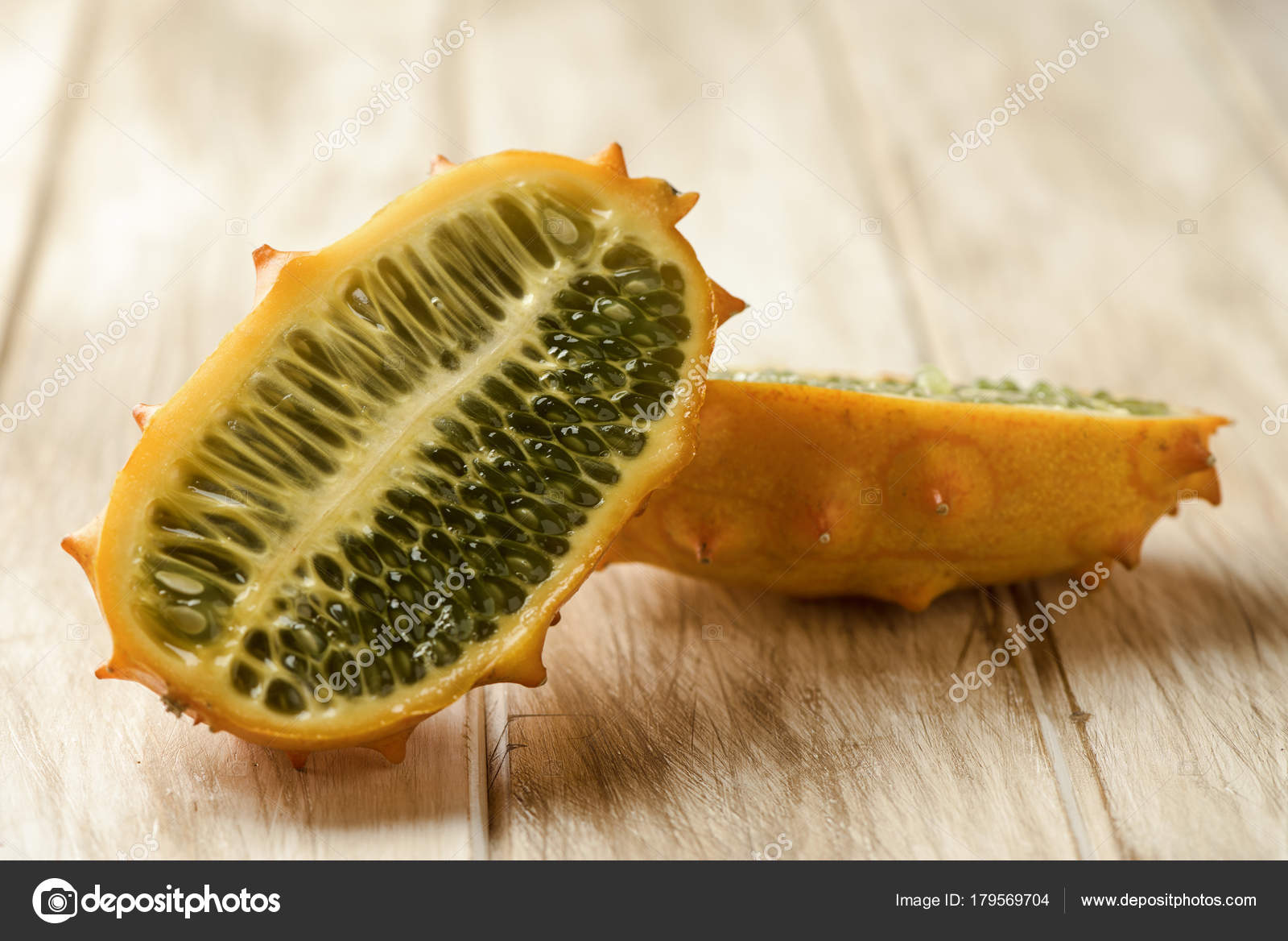 Kiwano or horned melon cut in halves Stock Photo by ©nito103 179569704