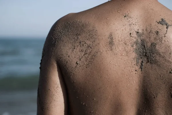 Joven en la playa — Foto de Stock