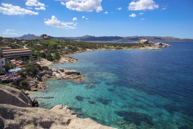BAJA SARDINIA, ITALY - SEPTEMBER 21, 2017: A view of the coast of Baja Sardinia, in Sardinia, Italy clipart