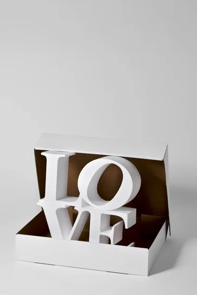 The word love in three dimensions in a box — Stock Photo, Image