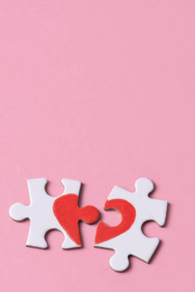 Puzzle pieces which form a heart — Stock Photo, Image
