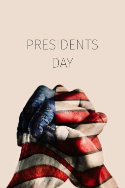 hands with flag of US and text presidents day clipart
