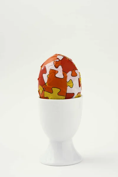 Homemade decorated easter egg in an egg-cup — Stock Photo, Image