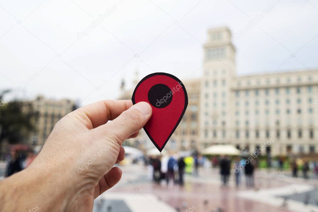 man with red marker in Placa Catalunya, Barcelon