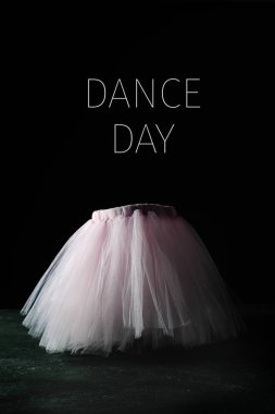 pink tutu and text dance day clipart