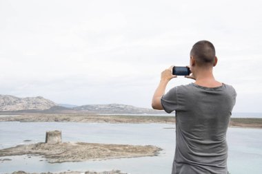 genç adam bir fotoğrafını Sardunya, İtalya