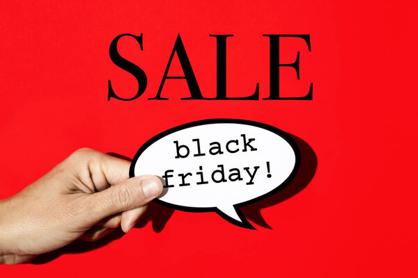 text black friday sale on a red background
