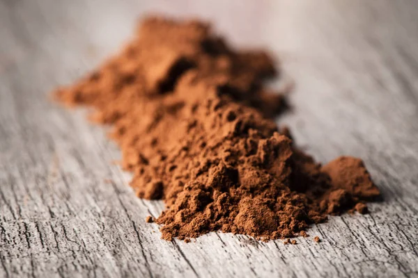 Cocoa powder on a table — Stock Photo, Image