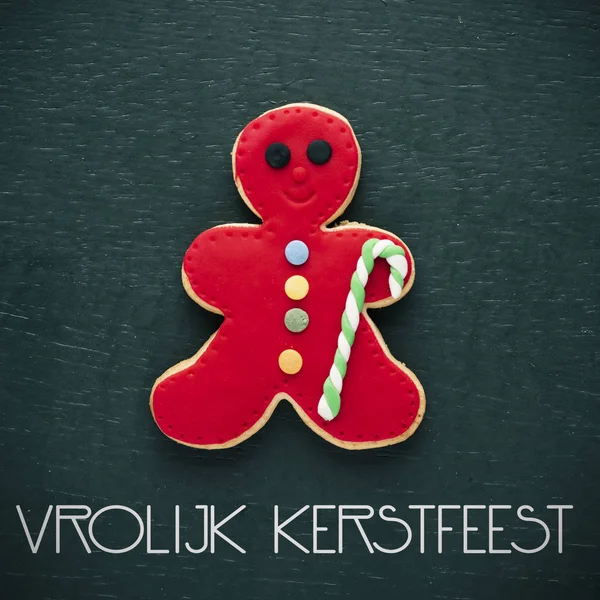 Lebkuchenmann und Text frohe Weihnachten in holländisch — Stockfoto