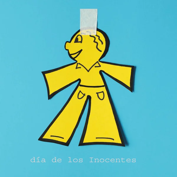 Bambola di carta e testo dia de los inocentes — Foto Stock