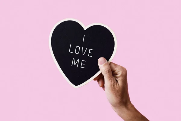 Tekst I love me in a heart-shaped sign — Zdjęcie stockowe