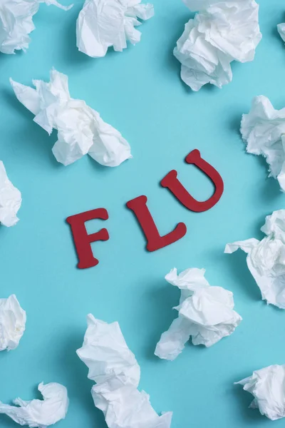 Word flu and a pile of used tissue — Stock Photo, Image