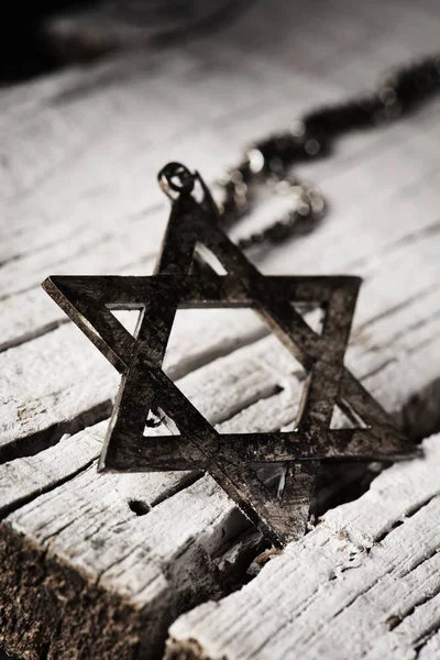 The star of david on a rustic wooden surface — 스톡 사진