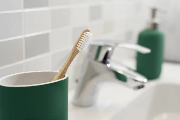 Bamboo toothbrush in the bathroom — 스톡 사진