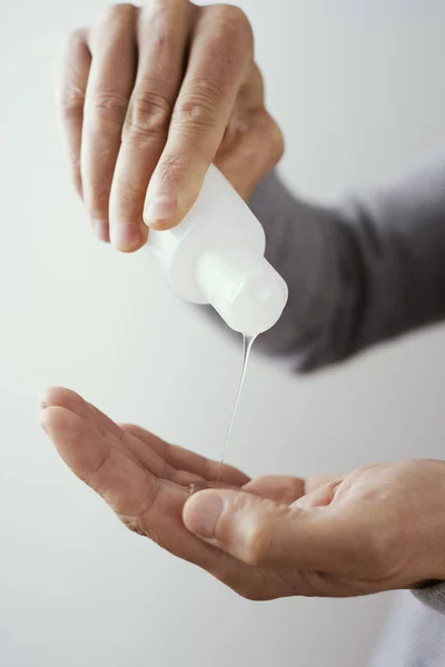 Closeup Caucasian Man Disinfecting His Hands Hand Sanitizer Bottle — Stock Photo, Image