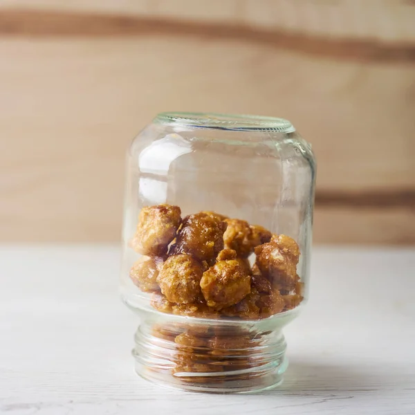 Közelkép Néhány Nueces Macadamia Garrapinadas Spanyol Kandírozott Makadámia Dió Üvegedényben — Stock Fotó