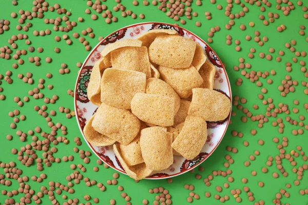 High Angle View Some Crispy Snacks Made Lentil Plate Green — Stock Photo, Image