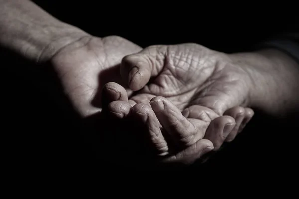 Closeup Young Caucasian Man Holding Hand Senior Caucasian Woman — Stock Photo, Image