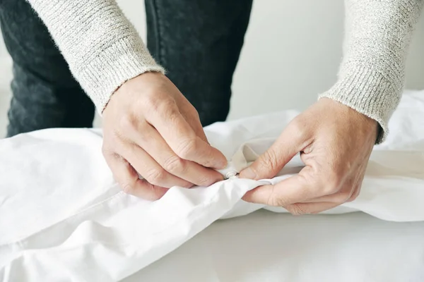 Closeup Young Caucasian Man Inserting Duvet White Duvet Cover Making — Stock Photo, Image