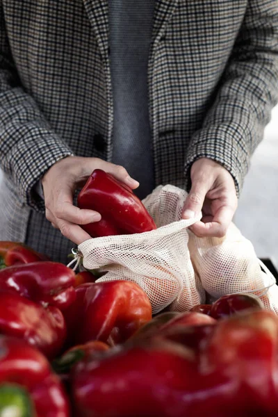 Closeup Man Shopping Greengrocer Putting Some Red Bell Peppers Textile — Stock Photo, Image