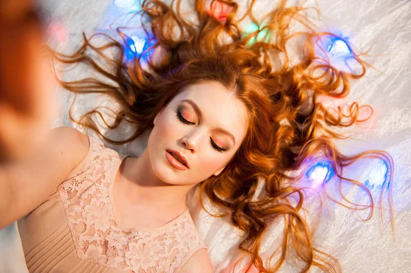 Woman relaxing lazing in the bedroom. — Stock Photo, Image