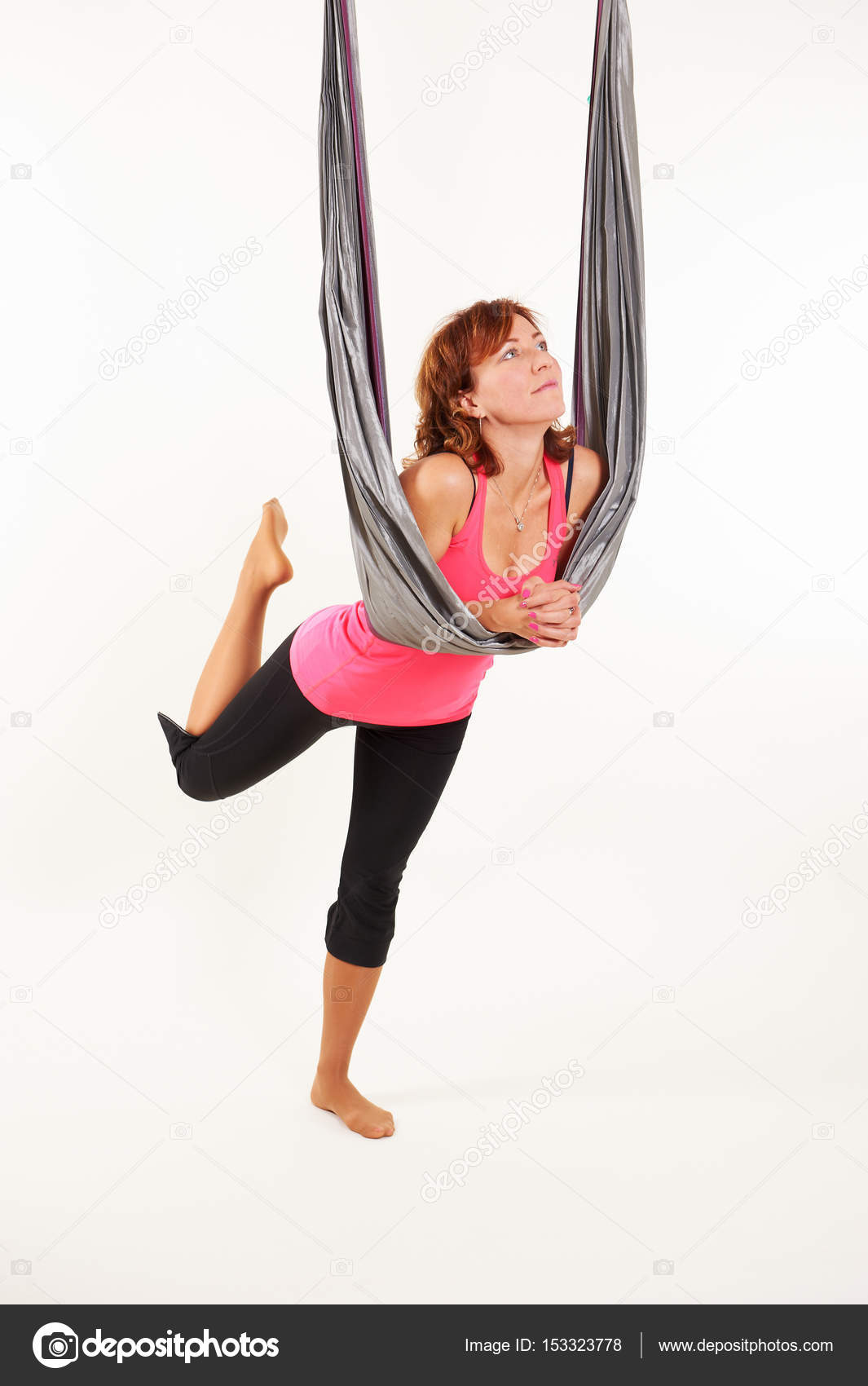 Single Calm Woman Sitting With Toes Pointed Down While Doing