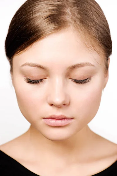 Beautiful woman face close up studio on white — Stock Photo, Image