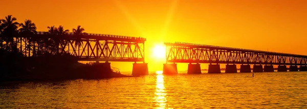 Sunset at broken bridge — Stock Photo, Image