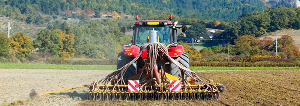 Ploughing heavy tractor during cultivation — Stock Photo, Image