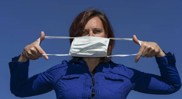 Woman Put Mask Blue Sky — Stock Photo, Image