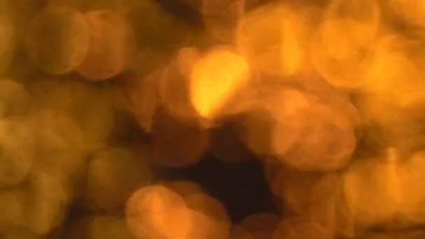 The night fountain in the defocus. Surface of water — Stock Video