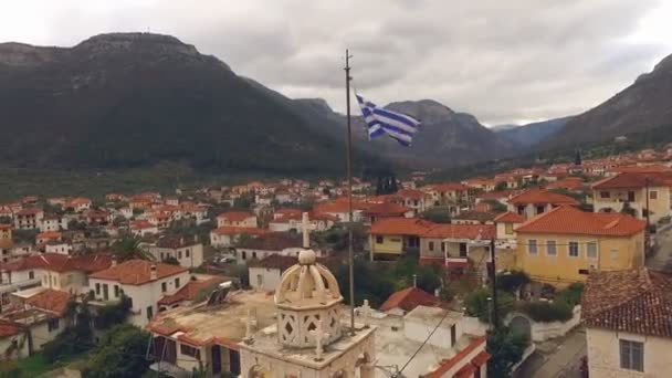 Drone is flying around the bell tower in the Greek city of Leonio — Stock Video