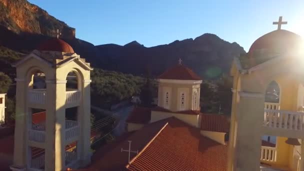 Greek cathedral in the rays of the rising sun — Stock Video