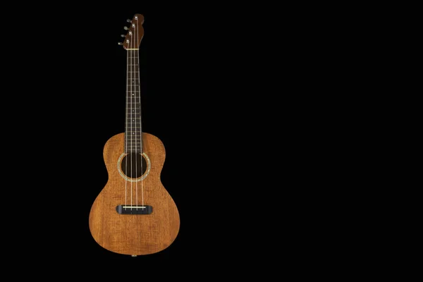 Siyah arka plan üzerine izole kahverengi ukulele, Hawai gitar,. — Stok fotoğraf