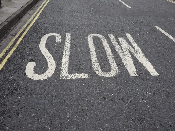 Slow street sign — Stock Photo, Image