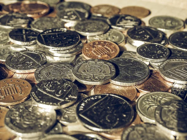 Винтажные фунтовые монеты — стоковое фото