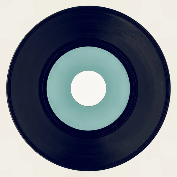 Vintage procurando disco de vinil com etiqueta azul — Fotografia de Stock