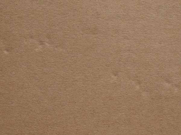 Kahverengi kıvrımlı karton desen arkaplanı — Stok fotoğraf