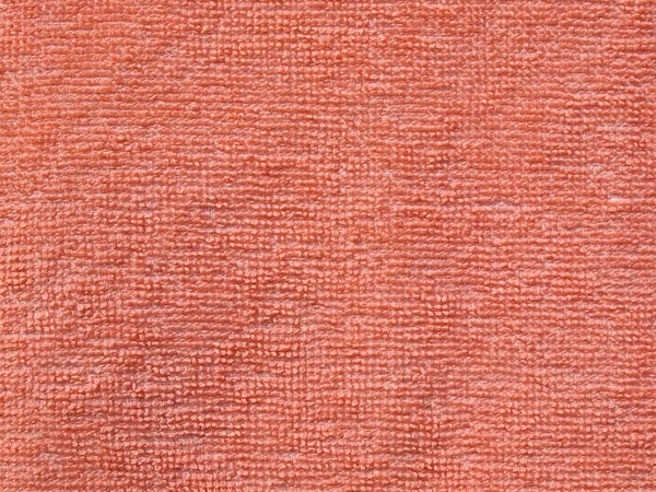Orange rosa tyg textur bakgrund — Stockfoto