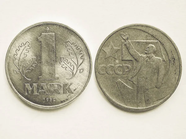 Vintage Vintage Russian ruble coin and German mark coin — Stock Photo, Image