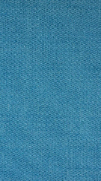 Голубая ткань фон текстуры - вертикальный — стоковое фото