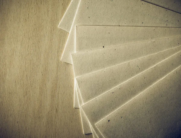 Vintage looking Letter envelope on wood table — Stock Photo, Image