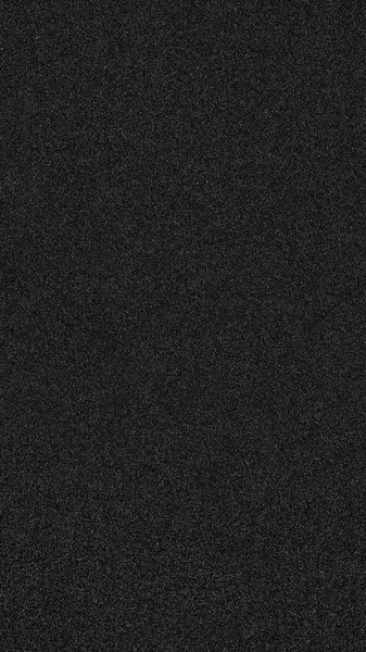 Donker zwarte achtergrond met glanzende spikkels - verticale — Stockfoto