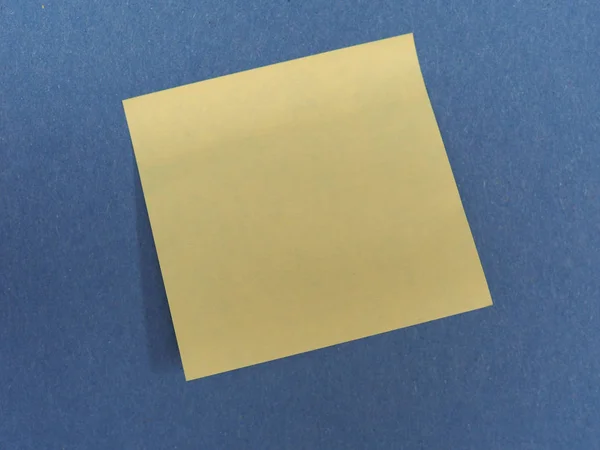 Postit over blue with copy space — Stock Photo, Image