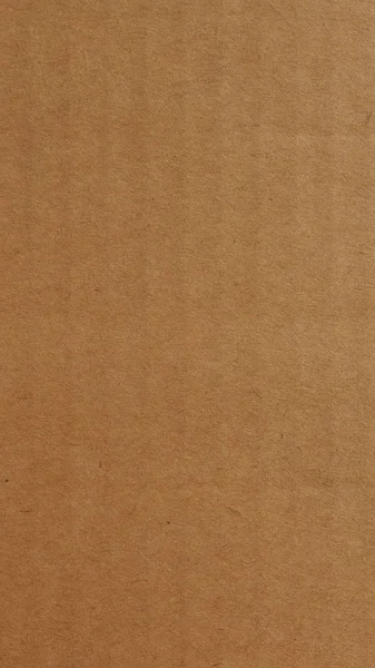 Brown corrugated cardboard background - vertical — Stock Photo, Image