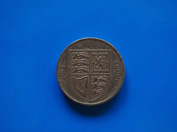 Moneda de una libra (GBP), Reino Unido (Reino Unido) sobre azul —  Fotos de Stock